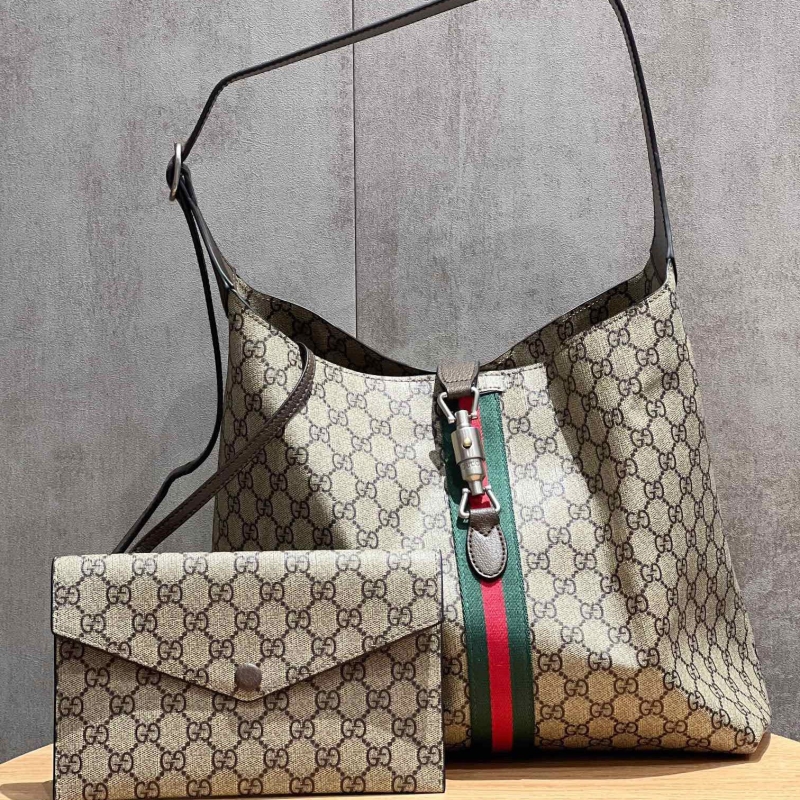 G*u*i top handle bags